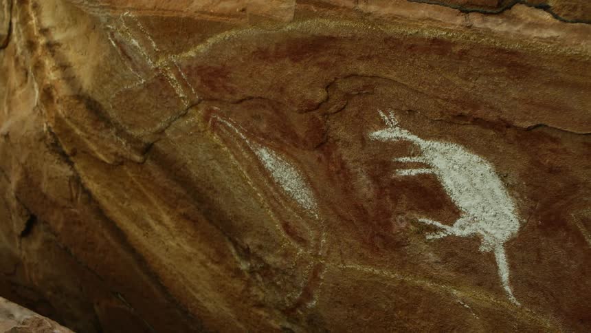 Ancient archaeological paintings on the vertical rock wall