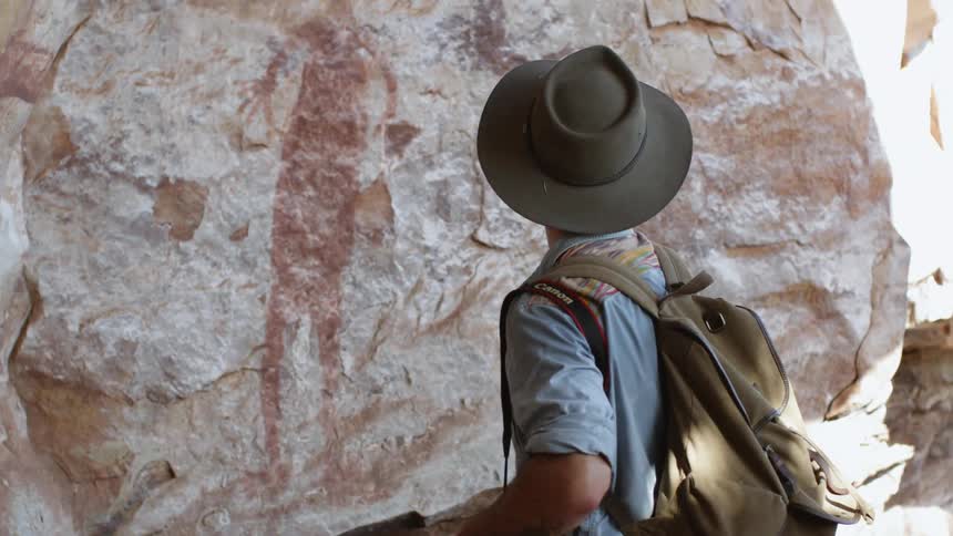 A man hikes around the canyon