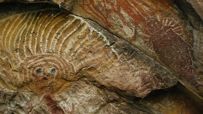 The rocks have old drawings and etchings