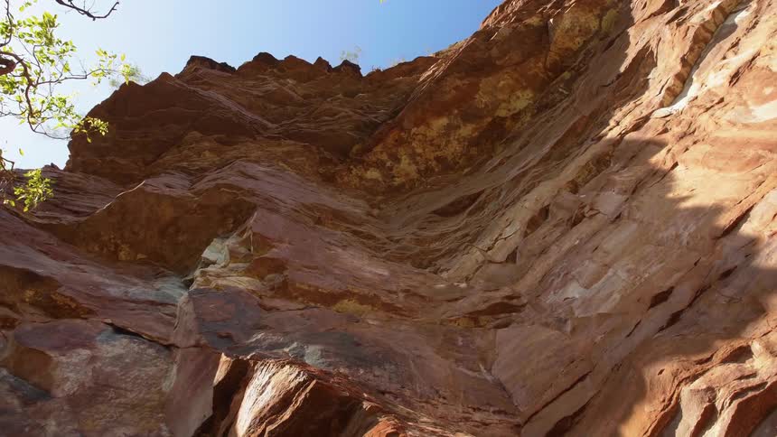 A rocky cliff in nature on a sunny summer day