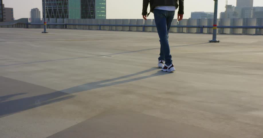 A person is walking in a downtown city