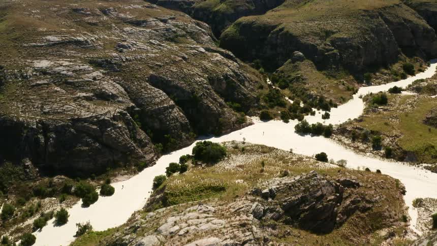 An aerial view of mountains is displayed