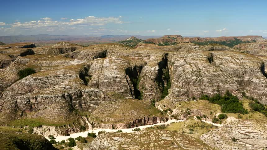 An aerial view of a canyon in the wilderness