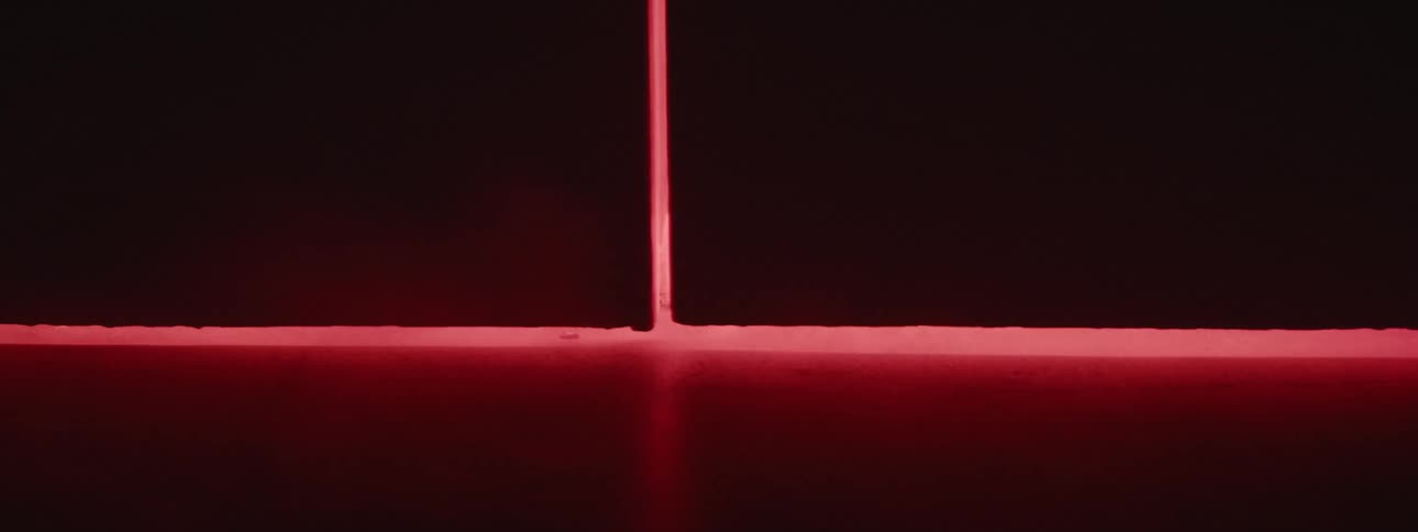 Creepy red lights and mist behind a door that opens