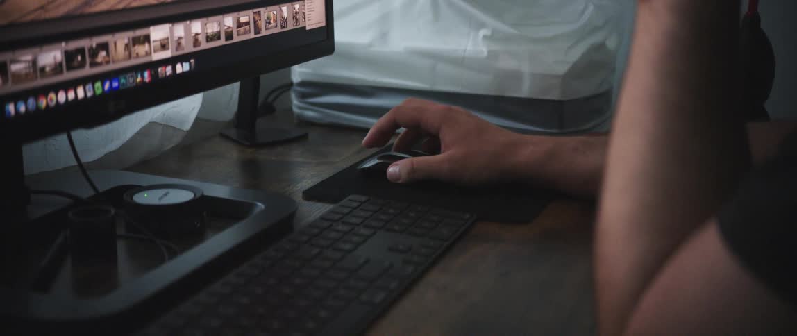 A man plays a game on his computer