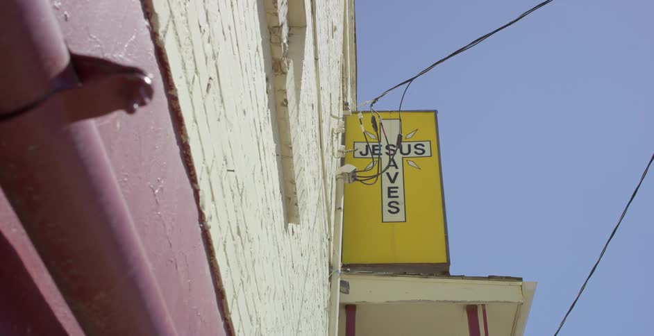 Sign outside a church in a small town reads jesus saves