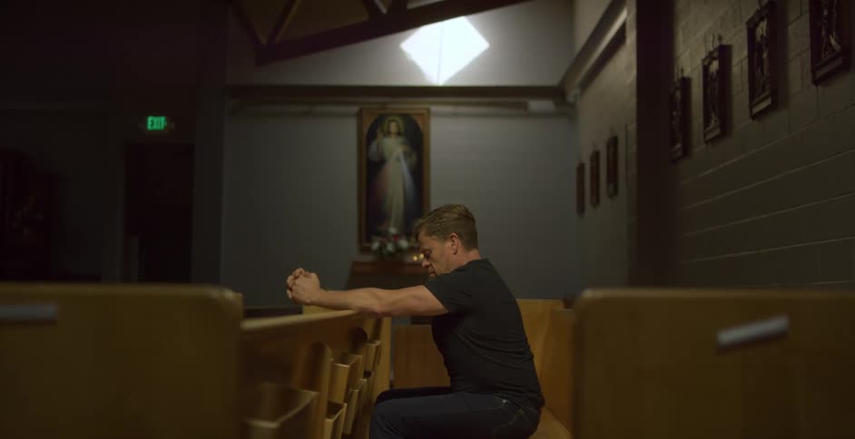 A man praying in church