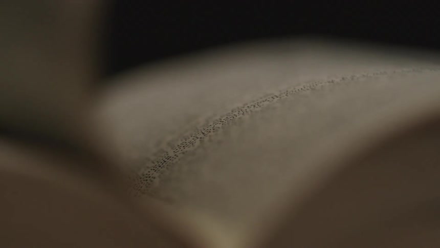 Flipping through pages of a book