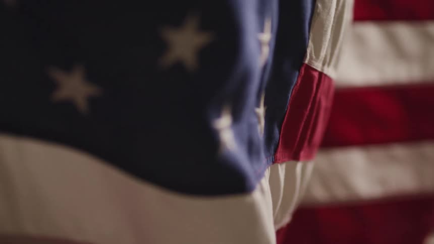 Close up of the american flag waving in the wind