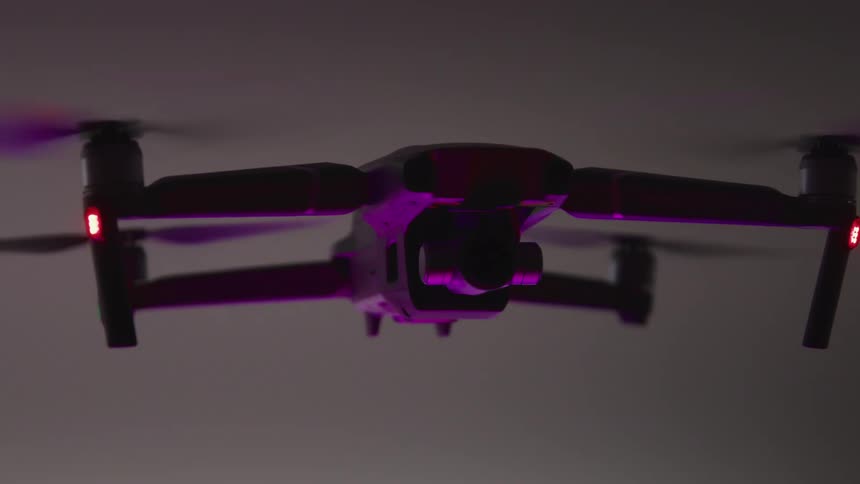 A drone hovers in the air