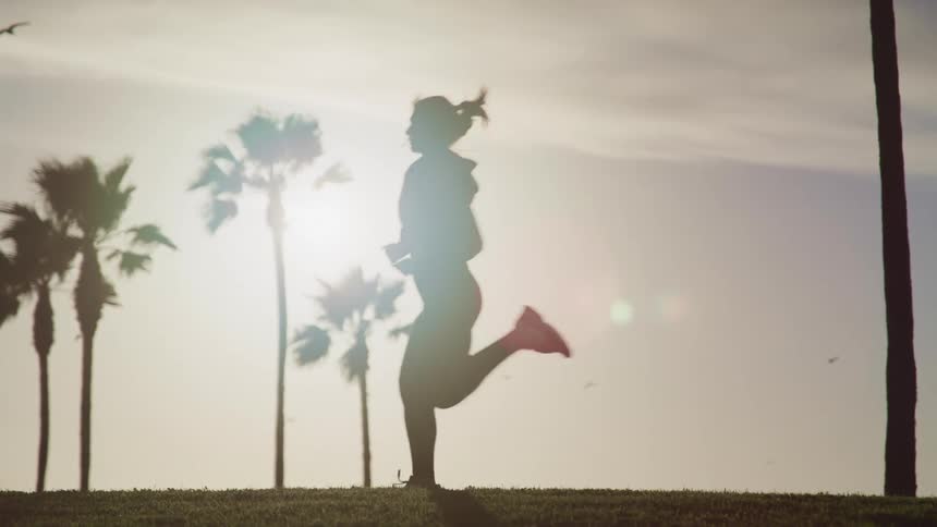 A woman running outdoors