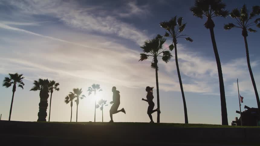 A man and woman running