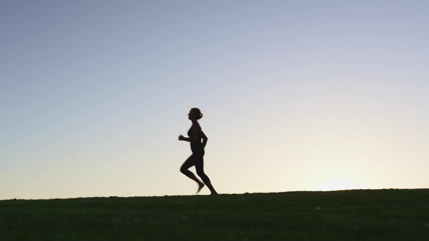 A woman running outside
