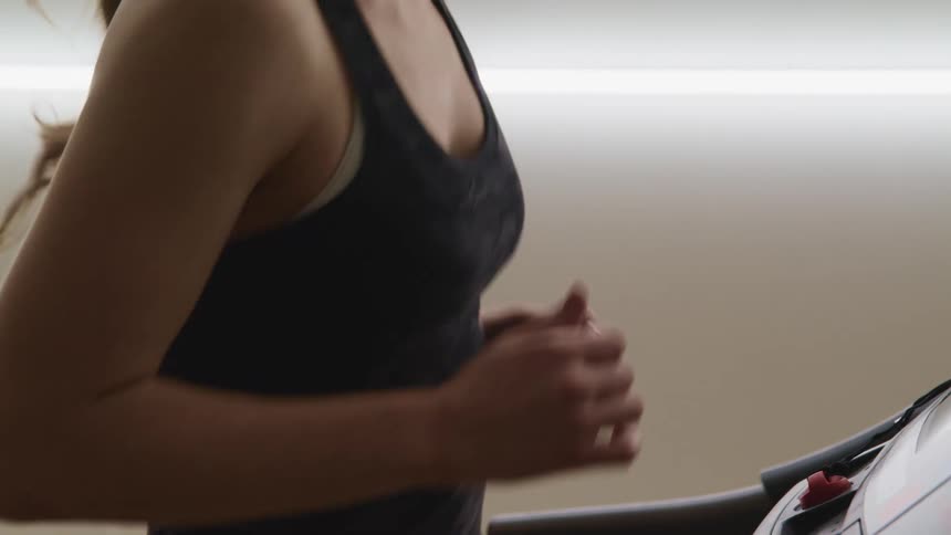 A female running on a treadmill