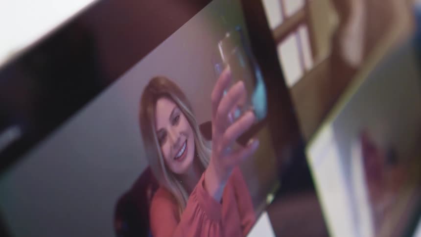 Close up of a computer screen with people on a video call