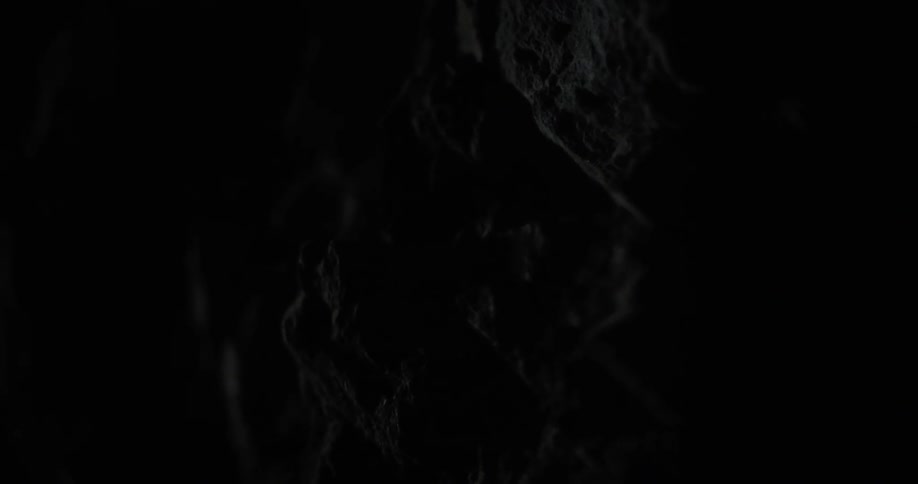 The wall of a dark cave