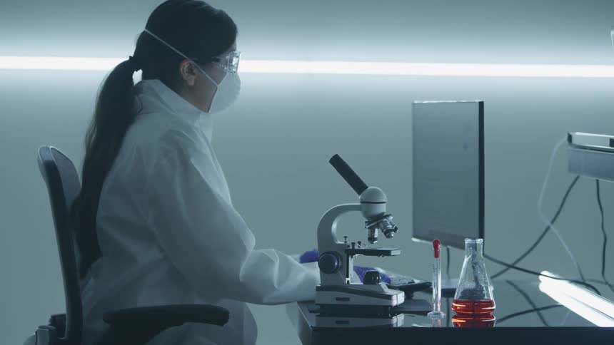A scientist is working in the lab
