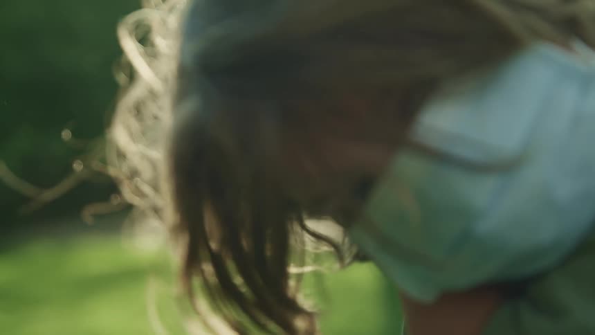 A little boy outside with a mask on