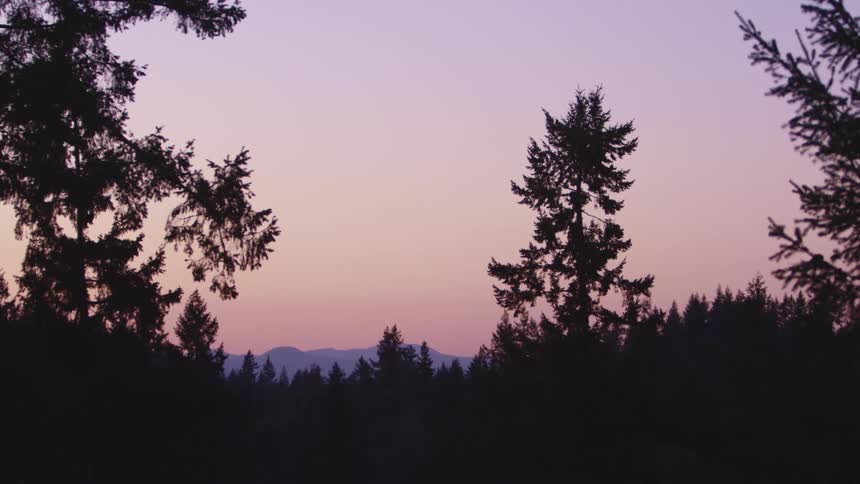 The sun is setting in the horizon