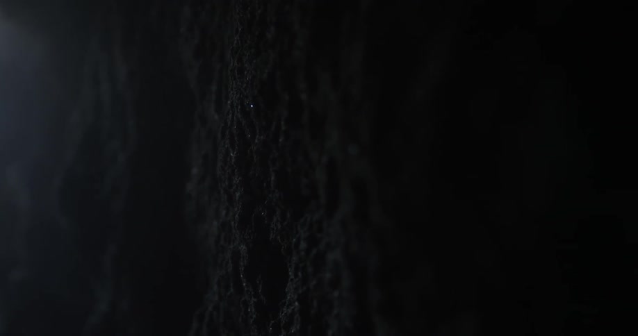 The wall of a dark cave