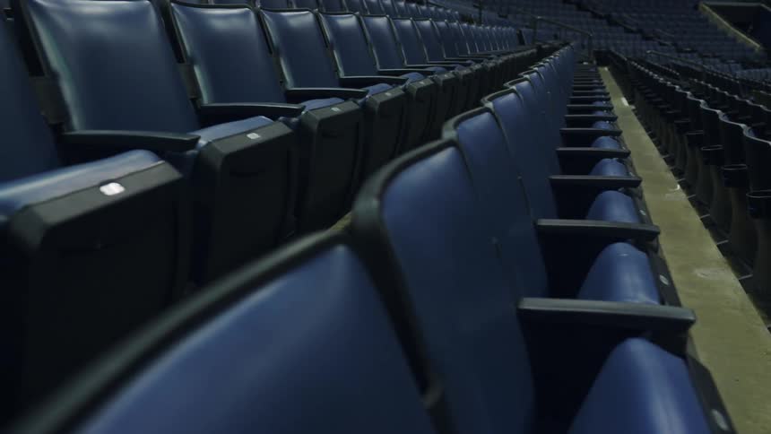 Rows of empty seats in a stadium