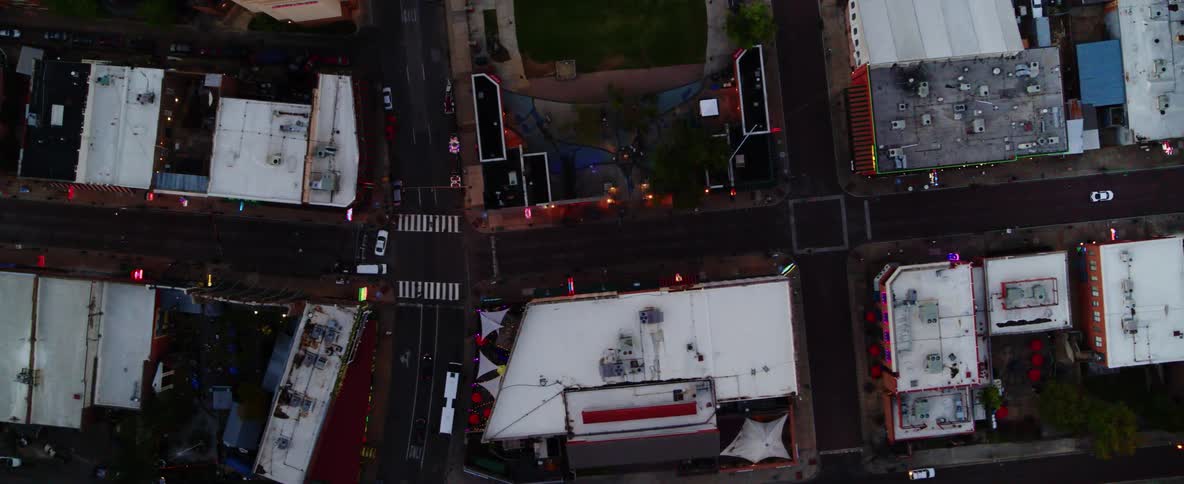Aerial view of buildings streets and cars in a town