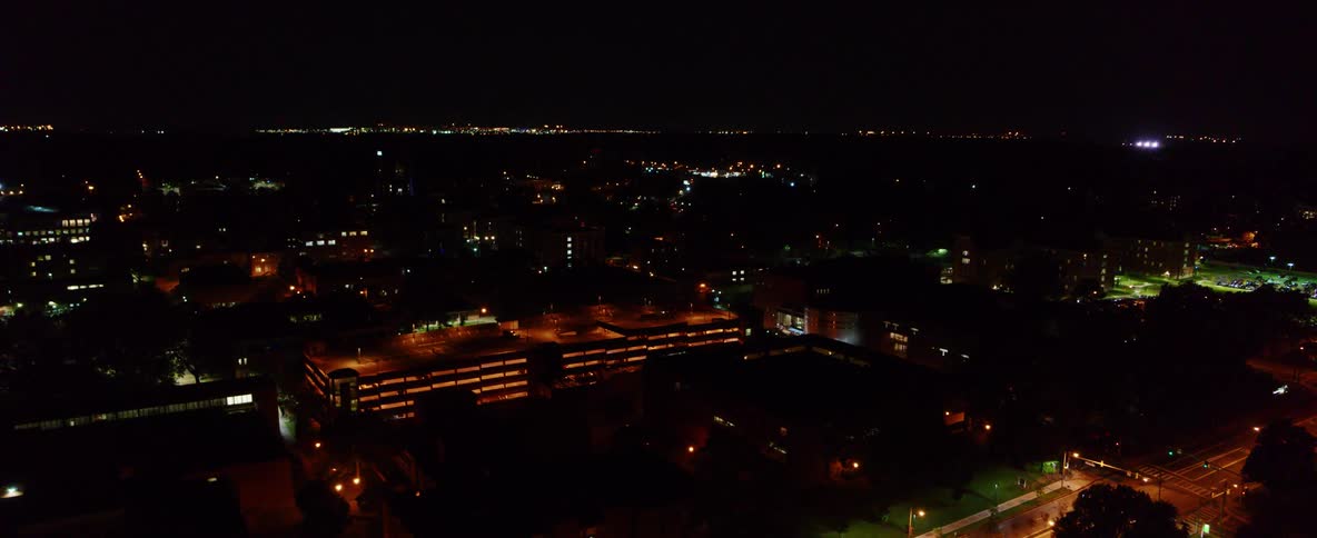 Aerial view of a city skyline at night