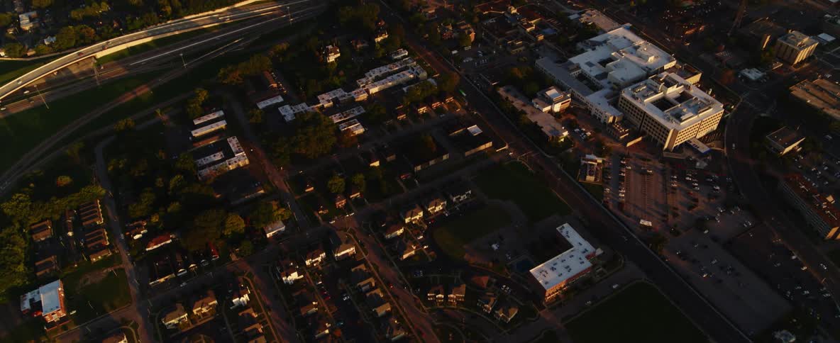 A birds eye view of a neighborhood with houses and roads