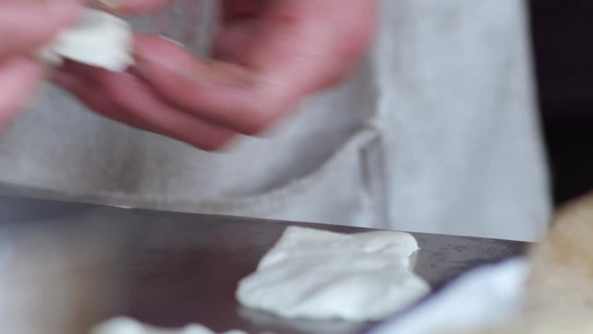 A man working with dough