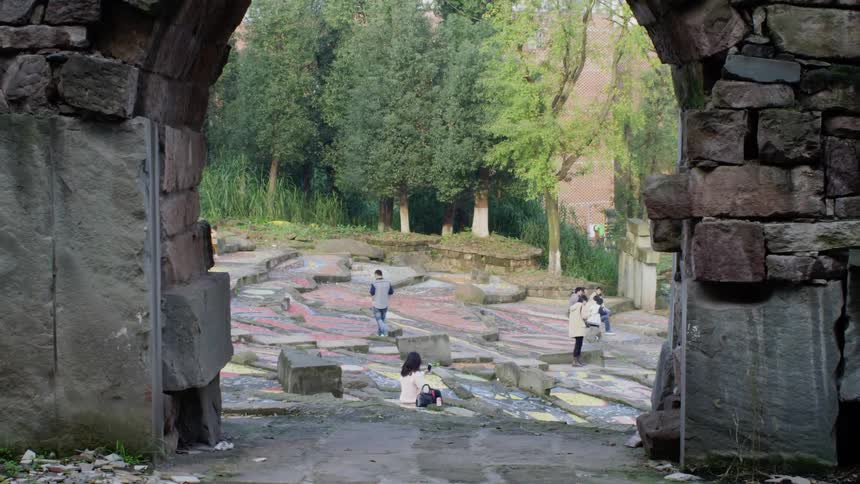People walking and sitting in a public area