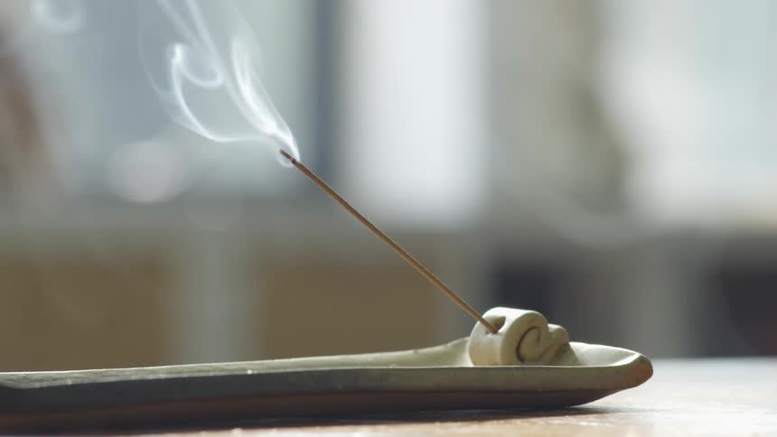 Incense burning indoors