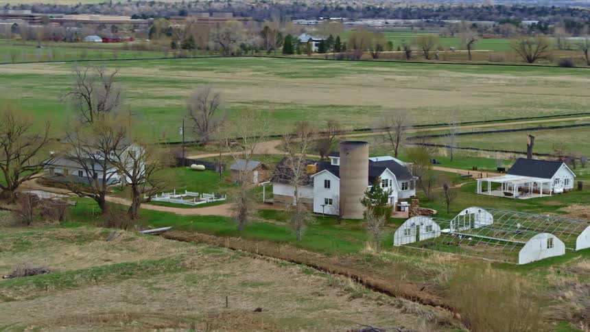 Aerial view of a farmland and the surrounding field