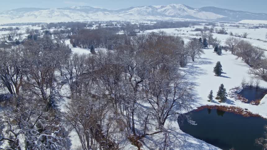 An aerial view of an arctic area is displayed