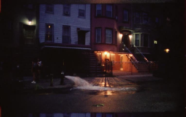 The fire hydrant is spraying water all over the street
