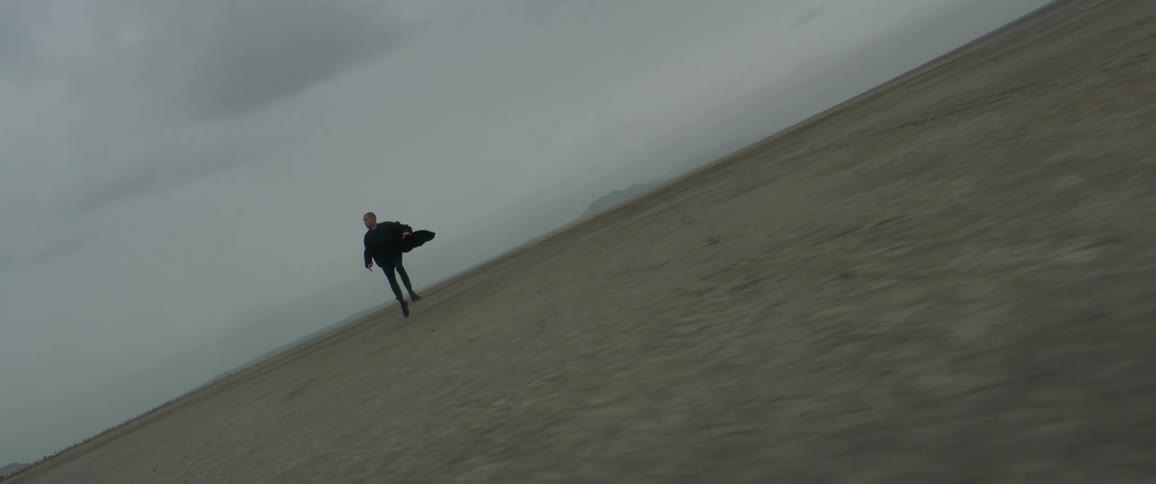 A man runs and stumbles