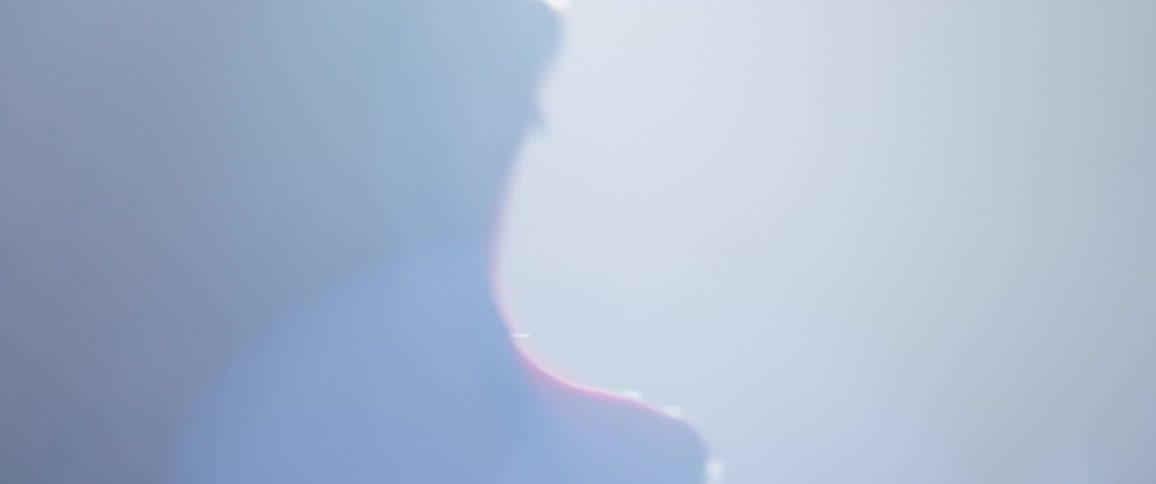 A person is opening and closing their mouth wide