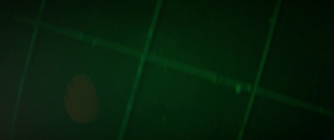Different colored lights flashing on a wall