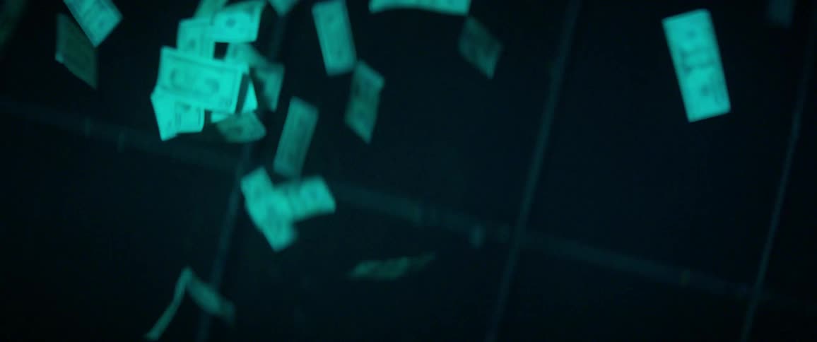 Money falls to the ground with flashing lights