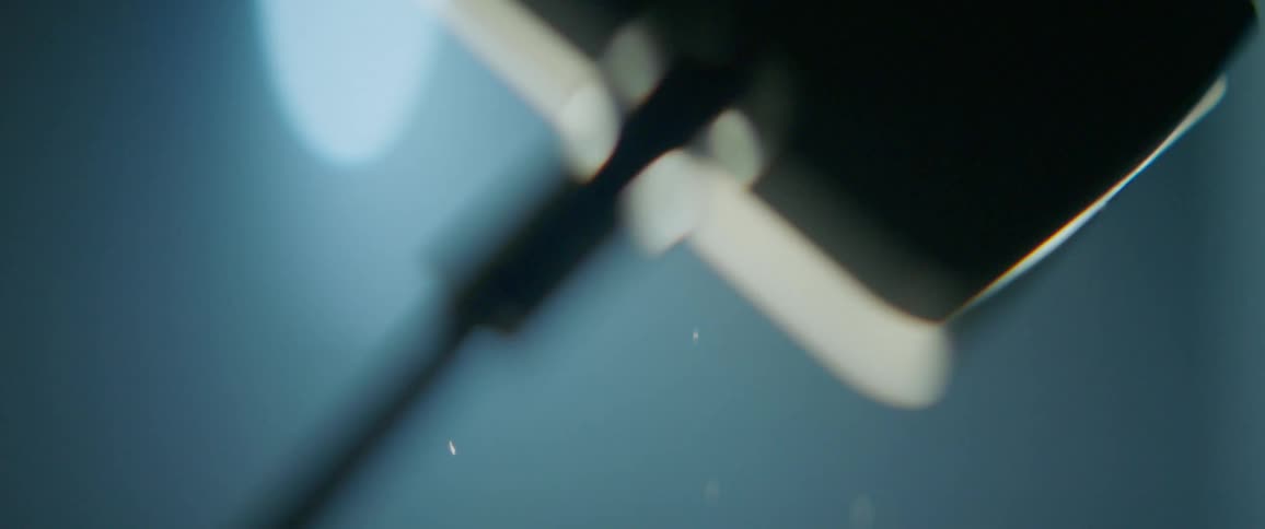 The dust flies around under the bright light