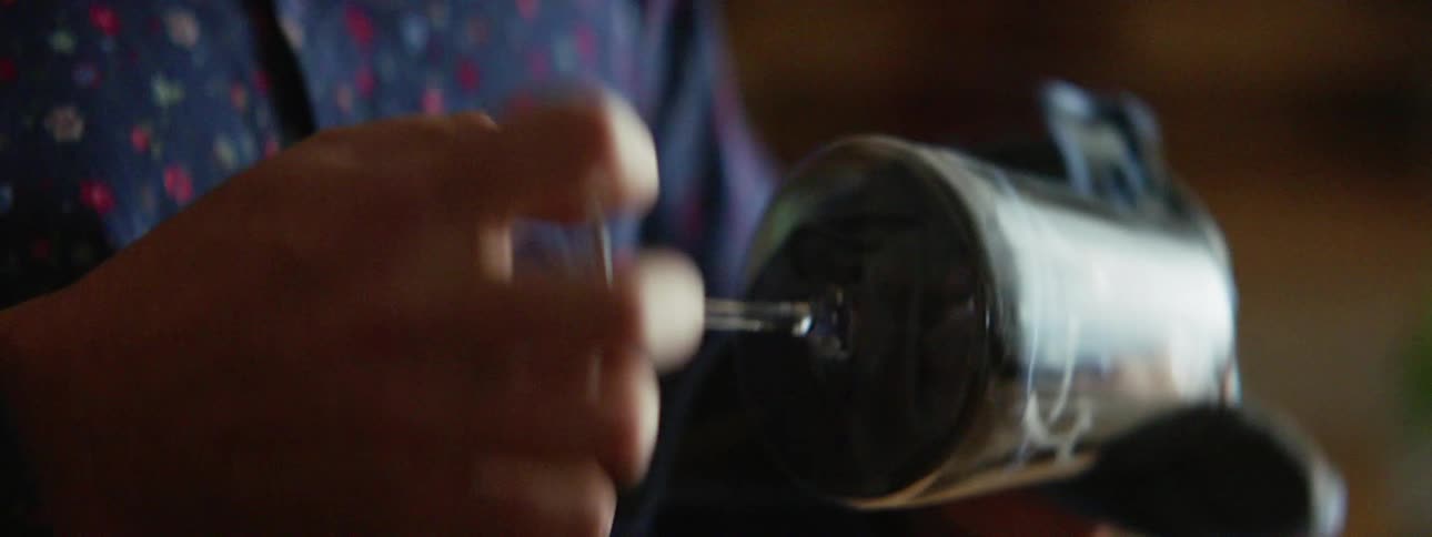 A man drying a french press