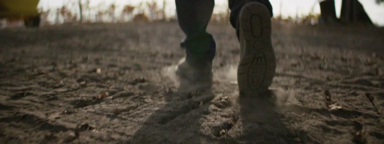 A man is hiking outdoors during midday