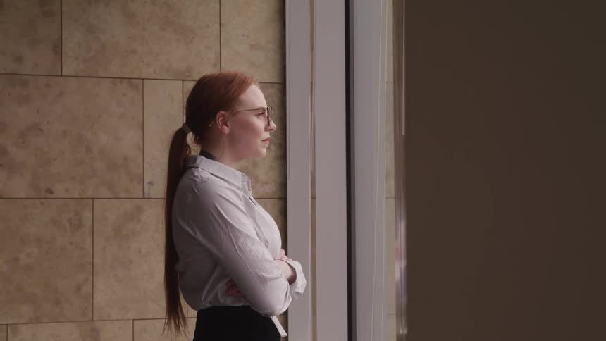 A woman in standing in a building