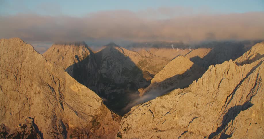 Aerial view of peaks in a mountain range