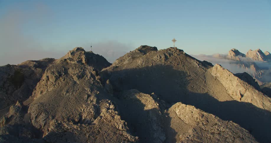An aerial view of a mountain is displayed