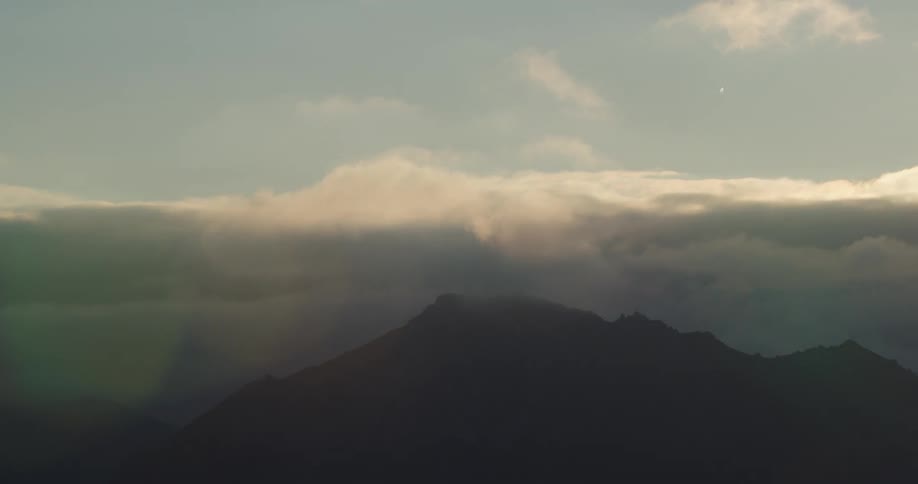 Aerial view of clouds over hills