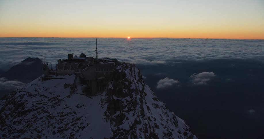 A lookout tower on top of a mountain