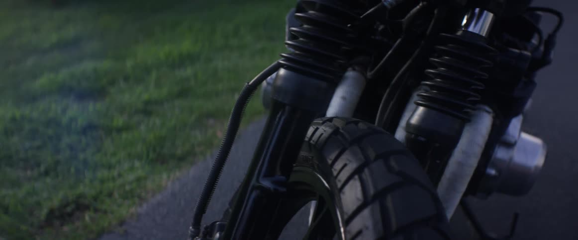 Close up of a motorcycle that is parked