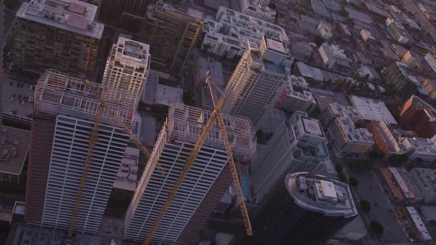 An aerial view of a downtown city is displayed