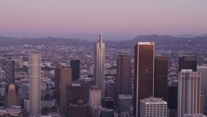 Aerial view of tall buildings skyscrapers and multiple buildings on the horizon