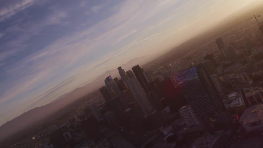 An aerial view of a city skyline with tall skyscrapers
